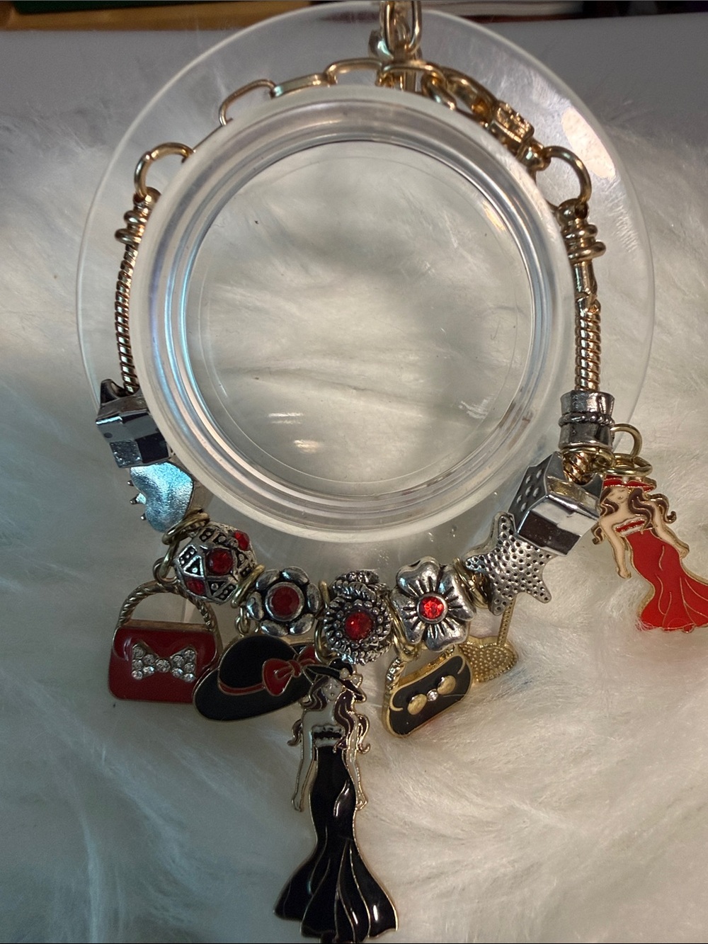 Gold-Tone Charm Bracelet with Black and Red Enamel Accents